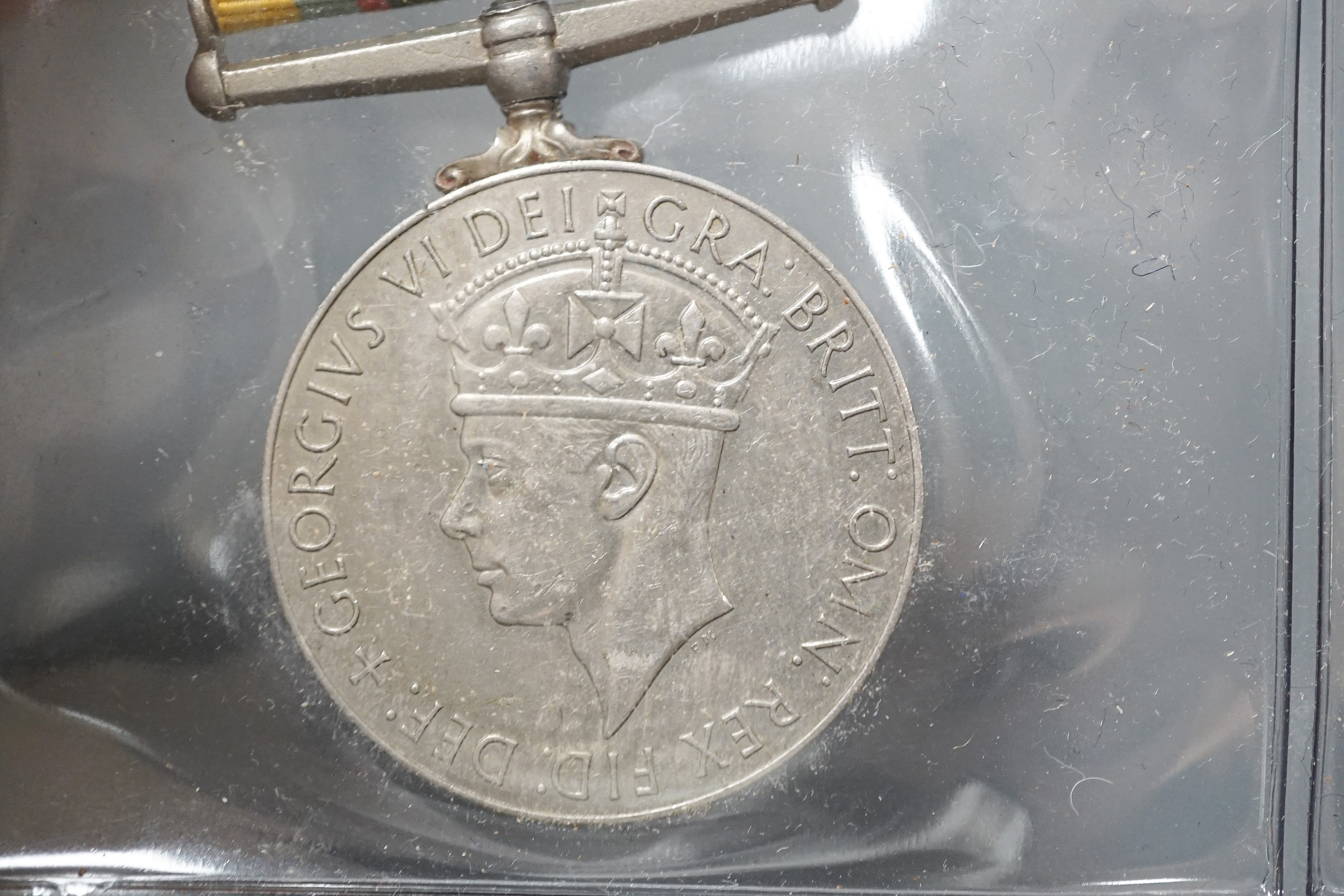 Four military medals - Korea medal to A. J. de Courcy Harrison, UN Korea medal, a George VI Cadet Forces medal and a GSM with Palestine clasp to 14158929 PTE. J. SANDERSON. A.C.C.